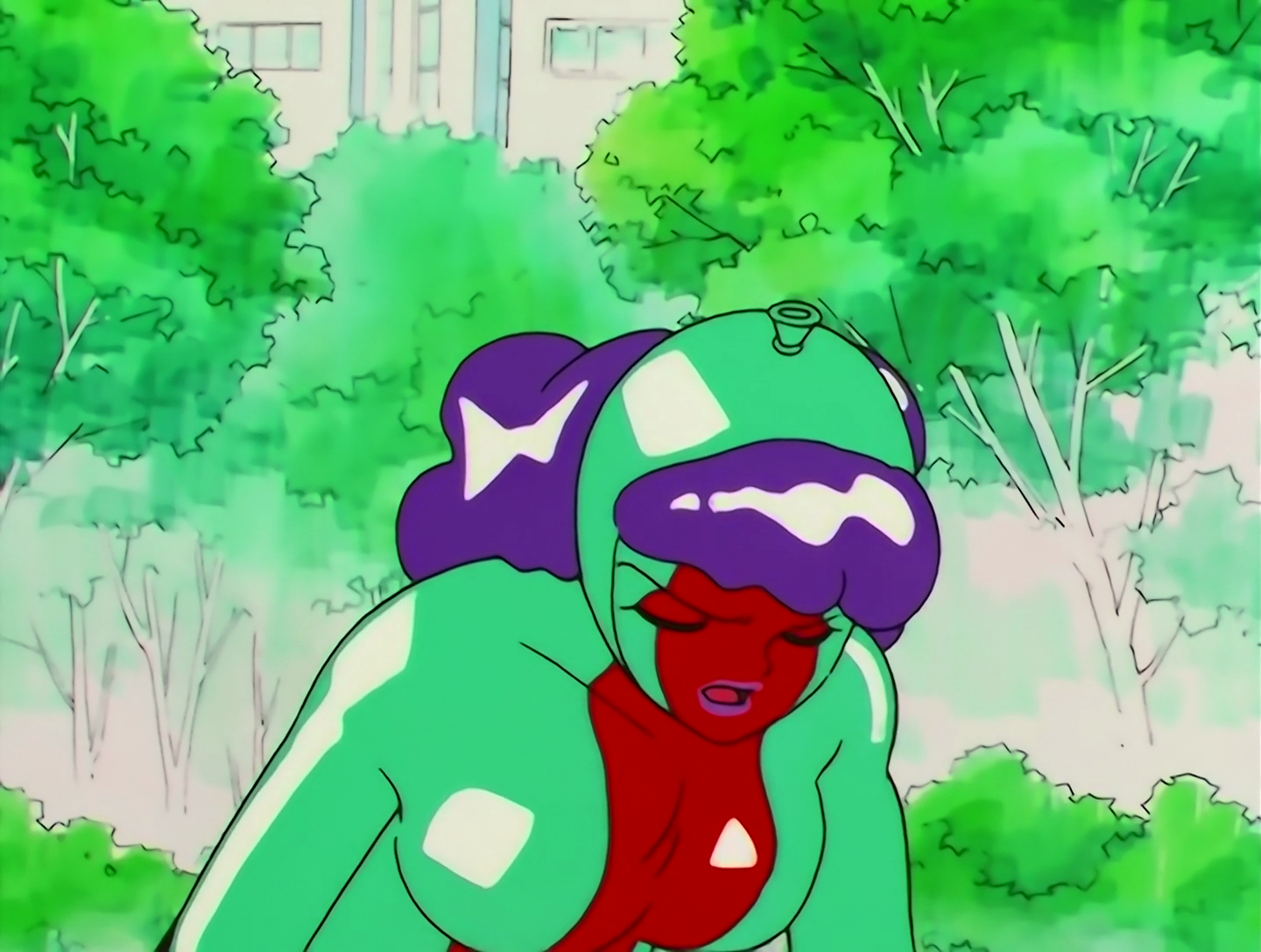 Puko has now taken on a more human form, though she’s still very clearly made of shiny rubber. She now has purple hair, also rubber.